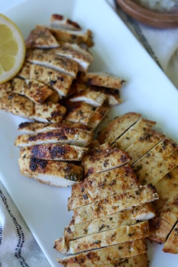 Blackstone chicken on white plate.