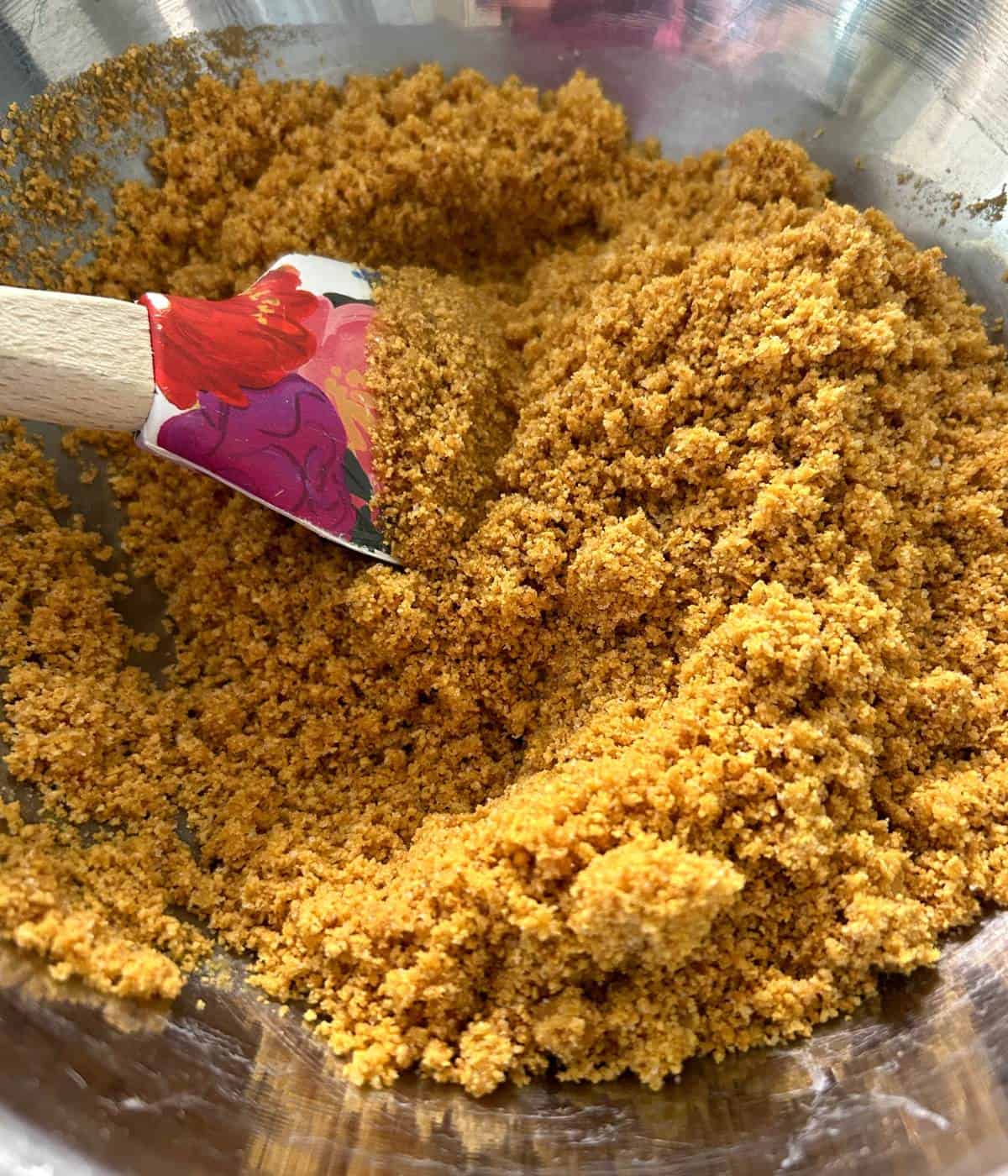 Graham cracker crumbs in bowl.