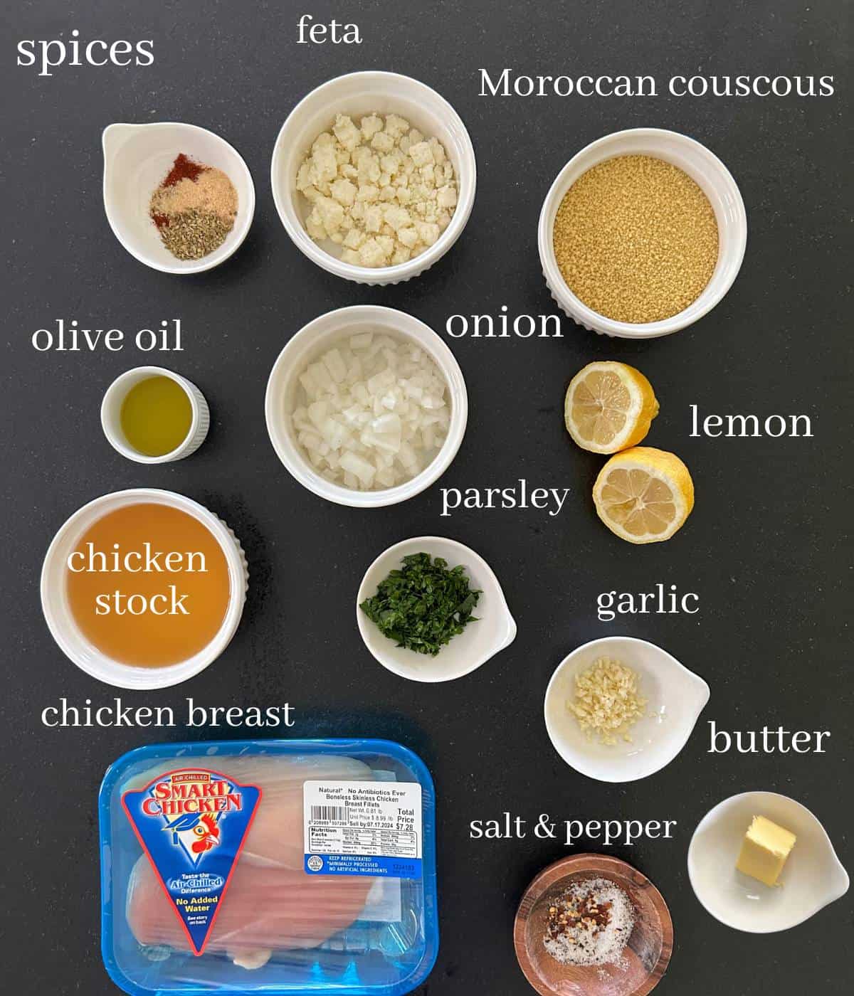 Ingredients for chicken and couscous on countertop.