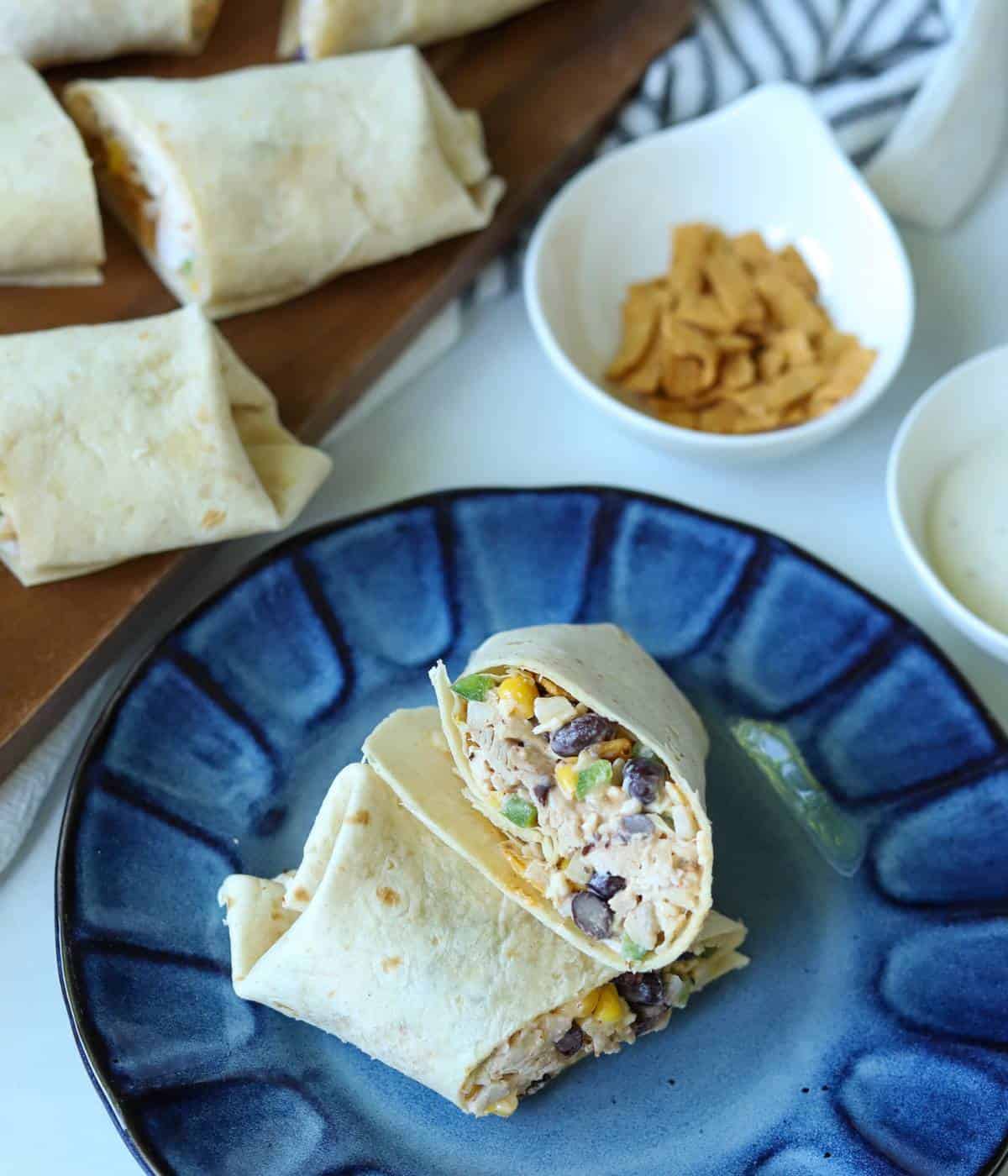 Southwest Chicken Wrap on plate sliced in half. 