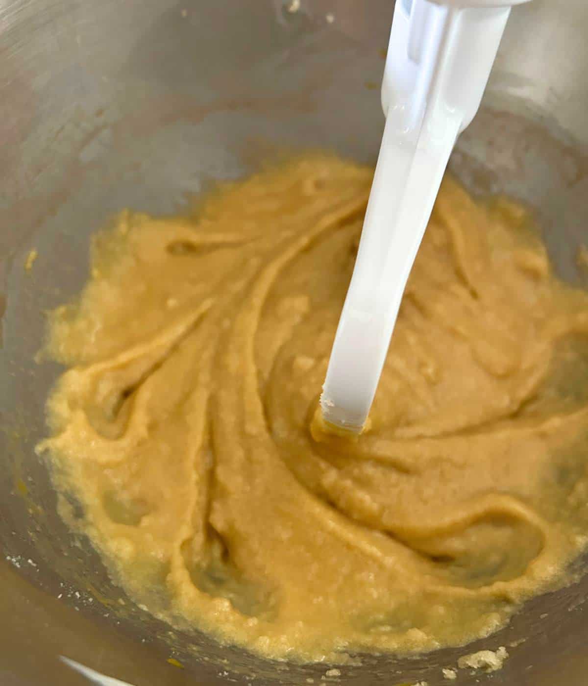 Wet ingredients in stand mixer.