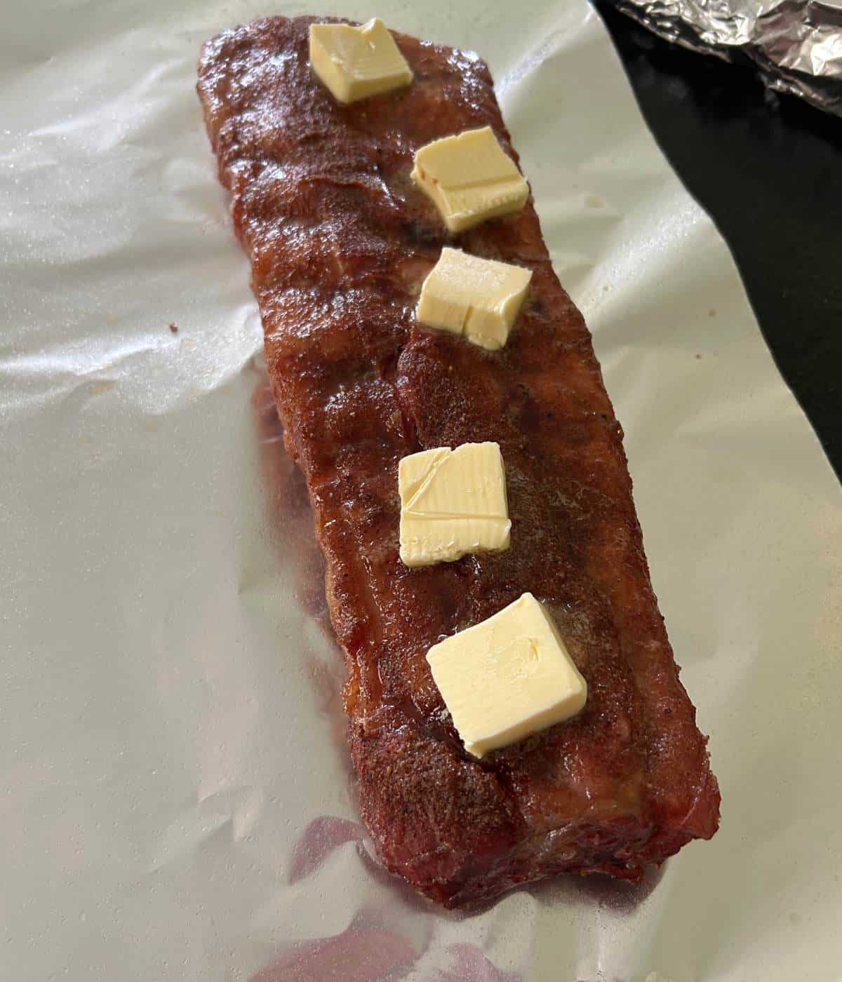 Ribs with butter and apple cider vinegar spray.