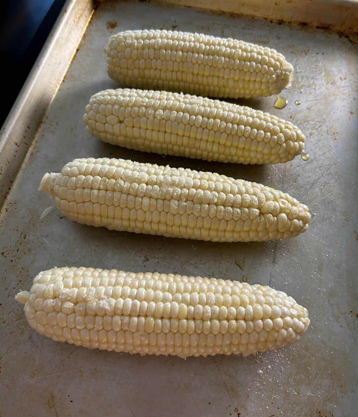 Corn on the cob with olive oil and salt.