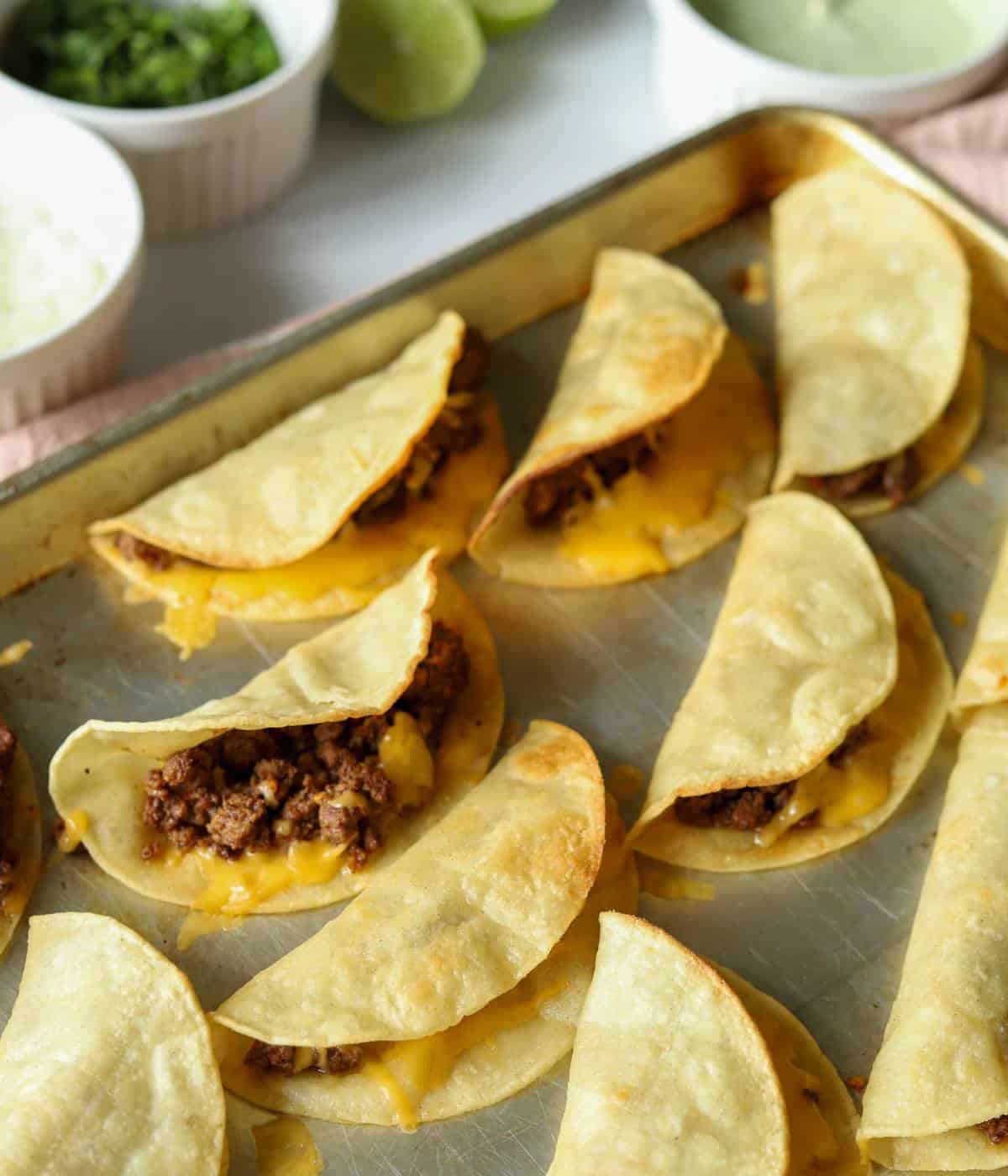 Crispy Beef Tacos on sheet pan.