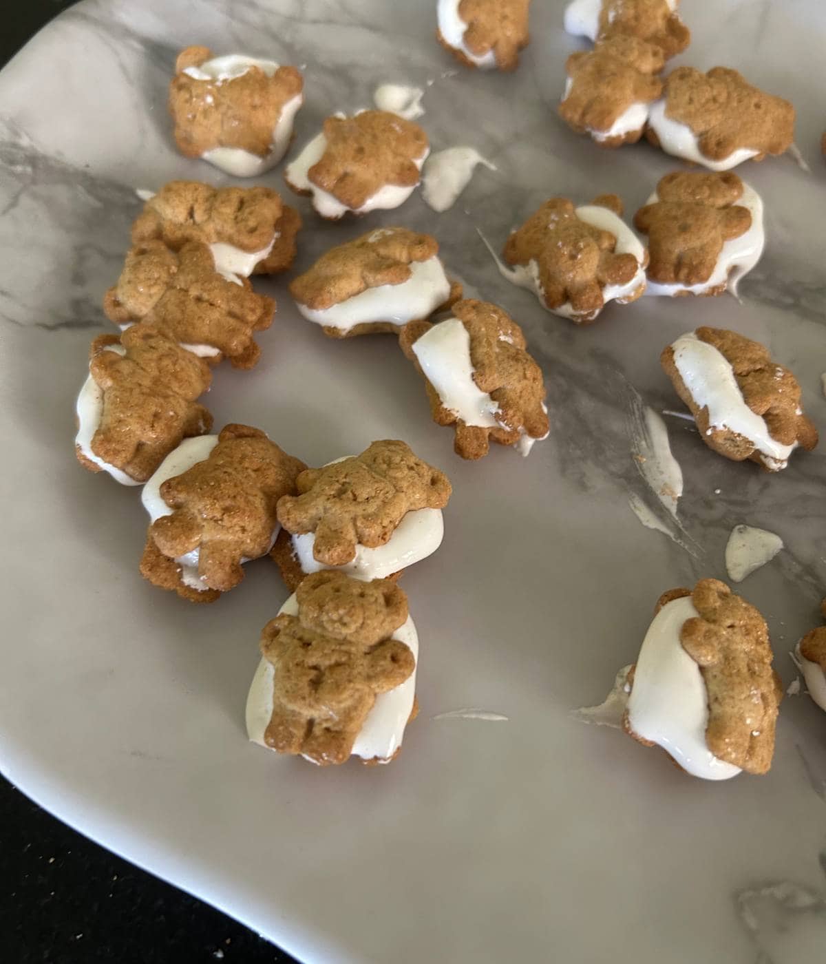 Teddy grahams sandwiched together with marshmallow fluff.