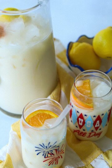 Orange Lemonade in pitcher.