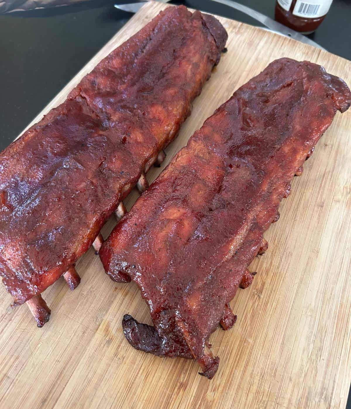 Pork ribs on cutting board.