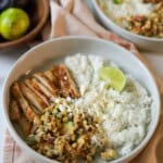 Chicken bowls with rice and street corn salad.