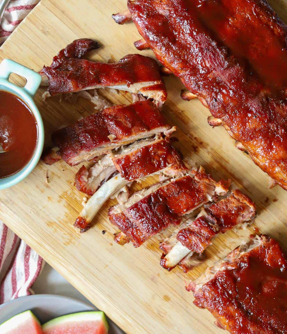 Smoked BBQ Pork Ribs on cutting board.