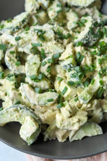 Creamy, spicy avocado salad in bowl.