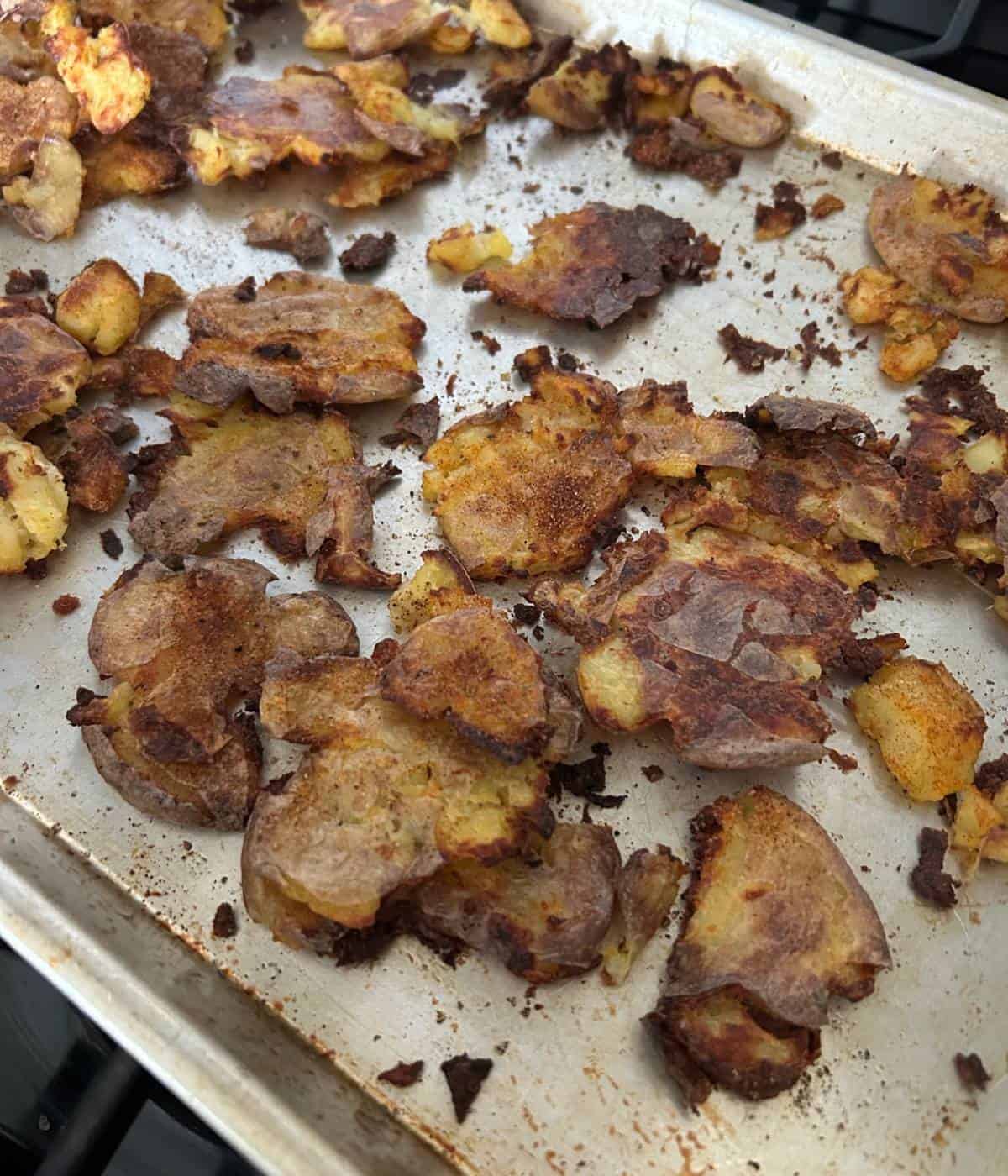 Crispy potatoes on cookie sheet.