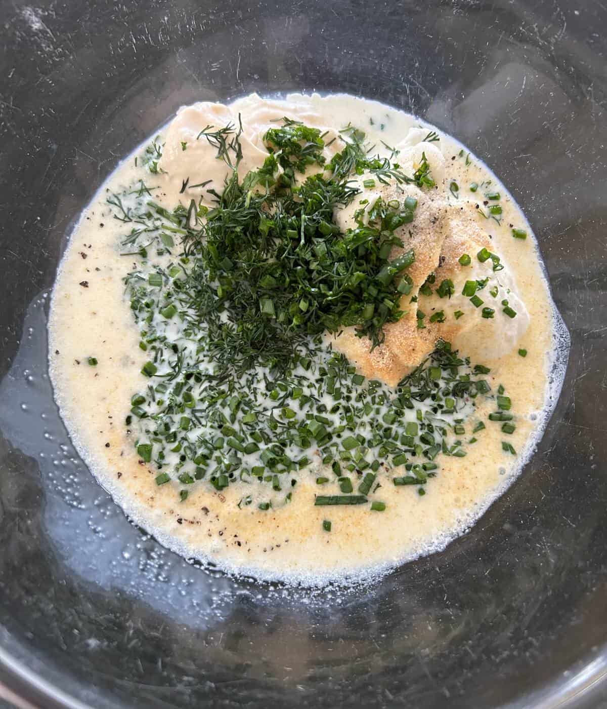 Ingredients for ranch dressing in bowl.