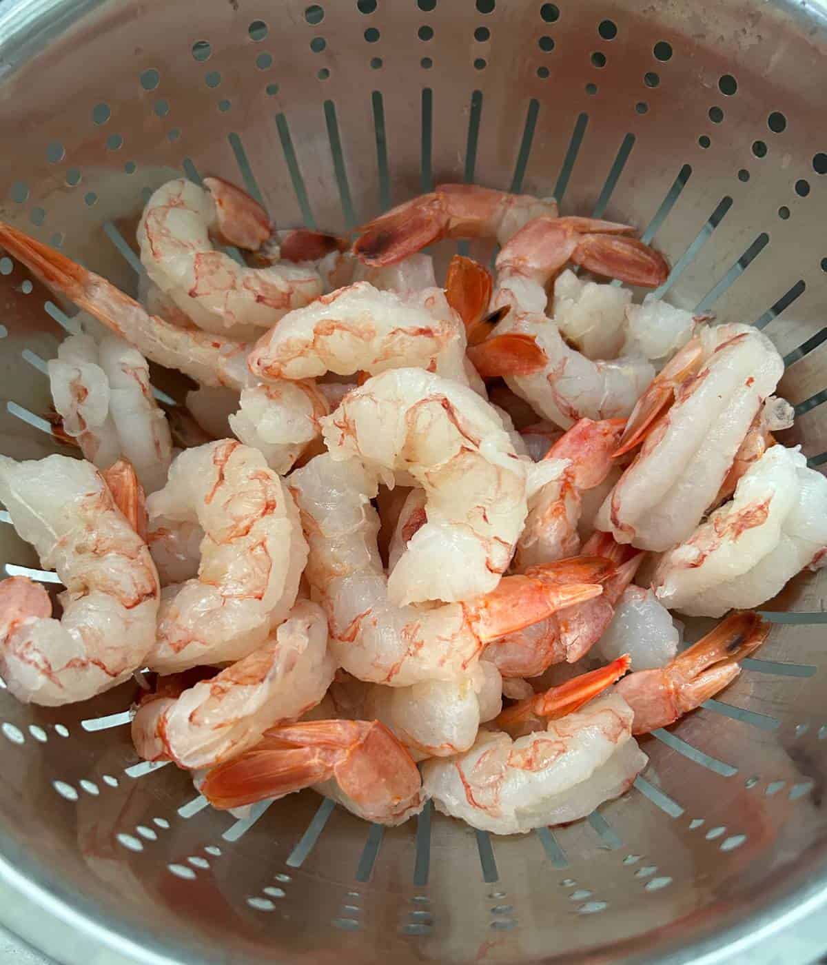 Shrimp in colander.