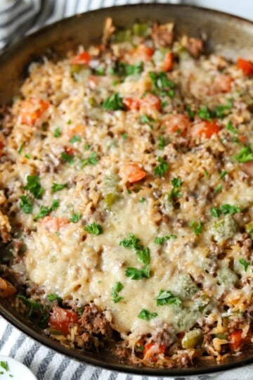 Deconstructed stuffed peppers in skillet.