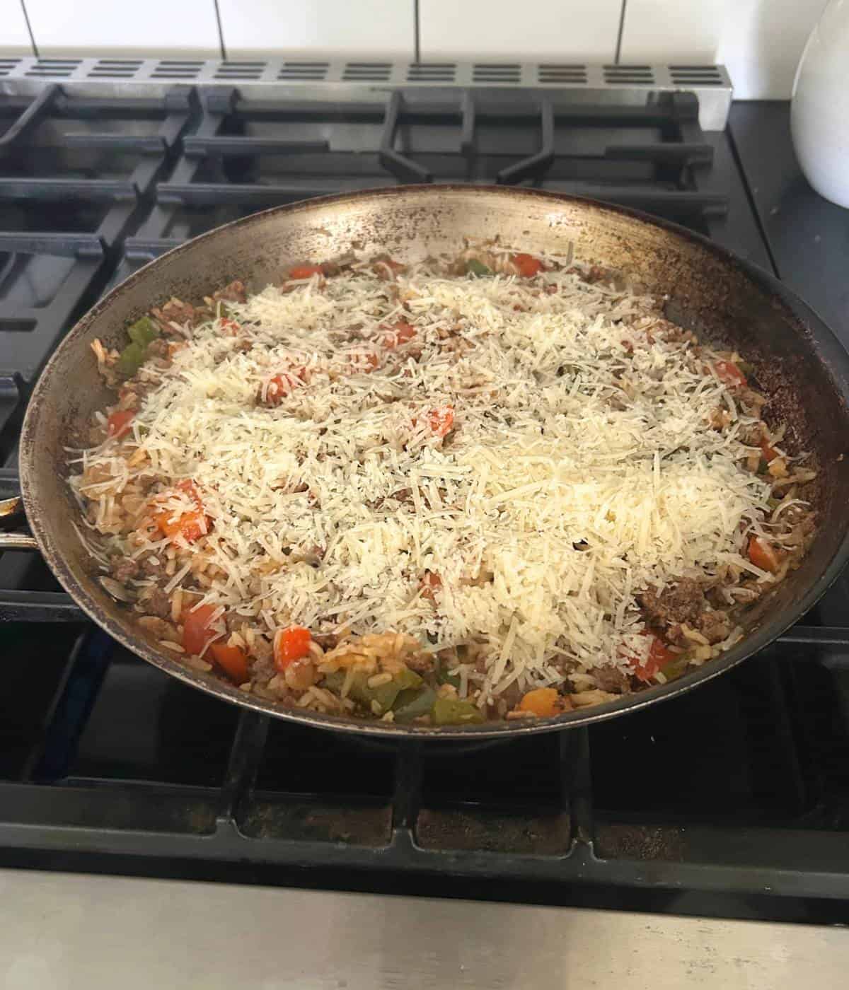 Cheese topped stuffed pepper skillet.