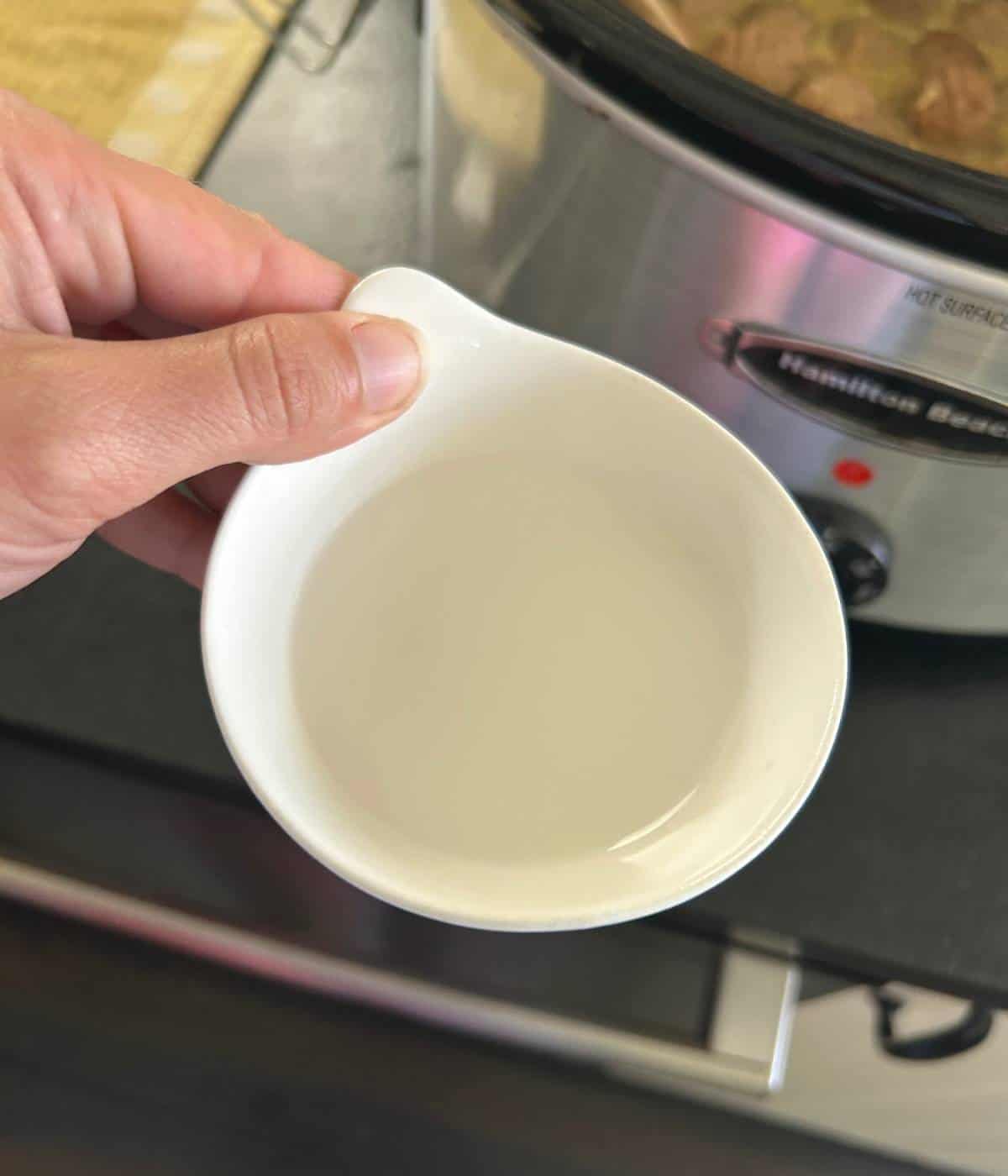 Cornstarch and water slurry in bowl.