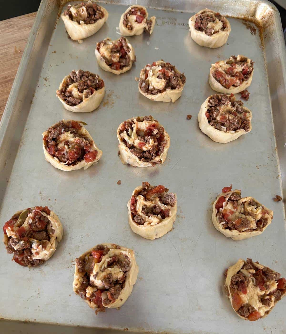 Ground Beef in crescent pinwheels.