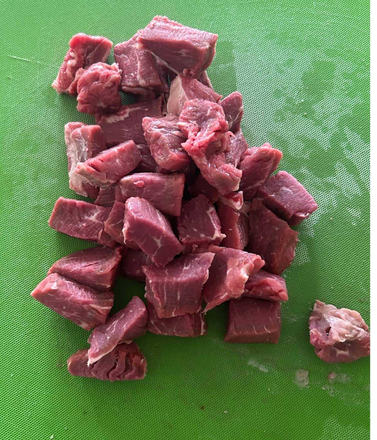 Filet steak cut into bite sized pieces.