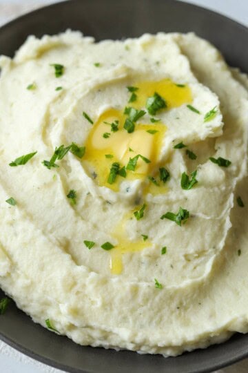 Boursin cheese mashed potatoes in dish.