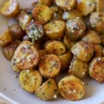 Herb roasted baby potatoes in serving bowl.