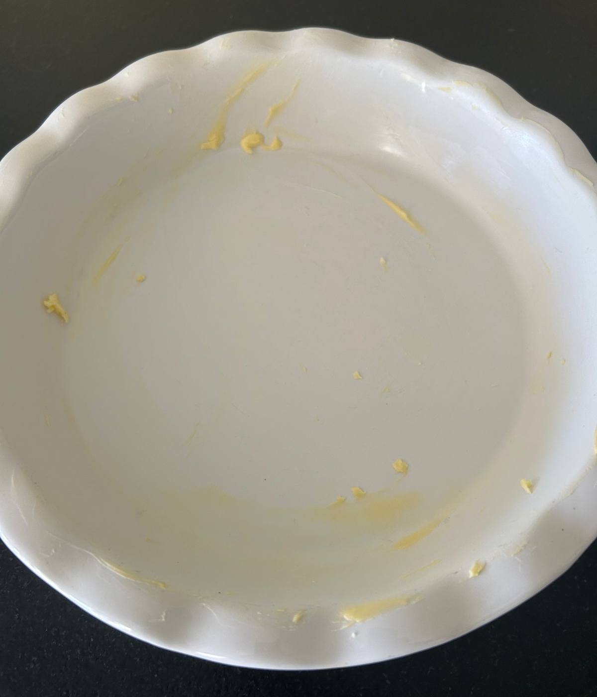 Buttered pie plate.