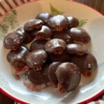 Chocolate Pecan Turtles on plate.