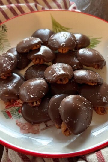 Chocolate Pecan Turtles on plate.