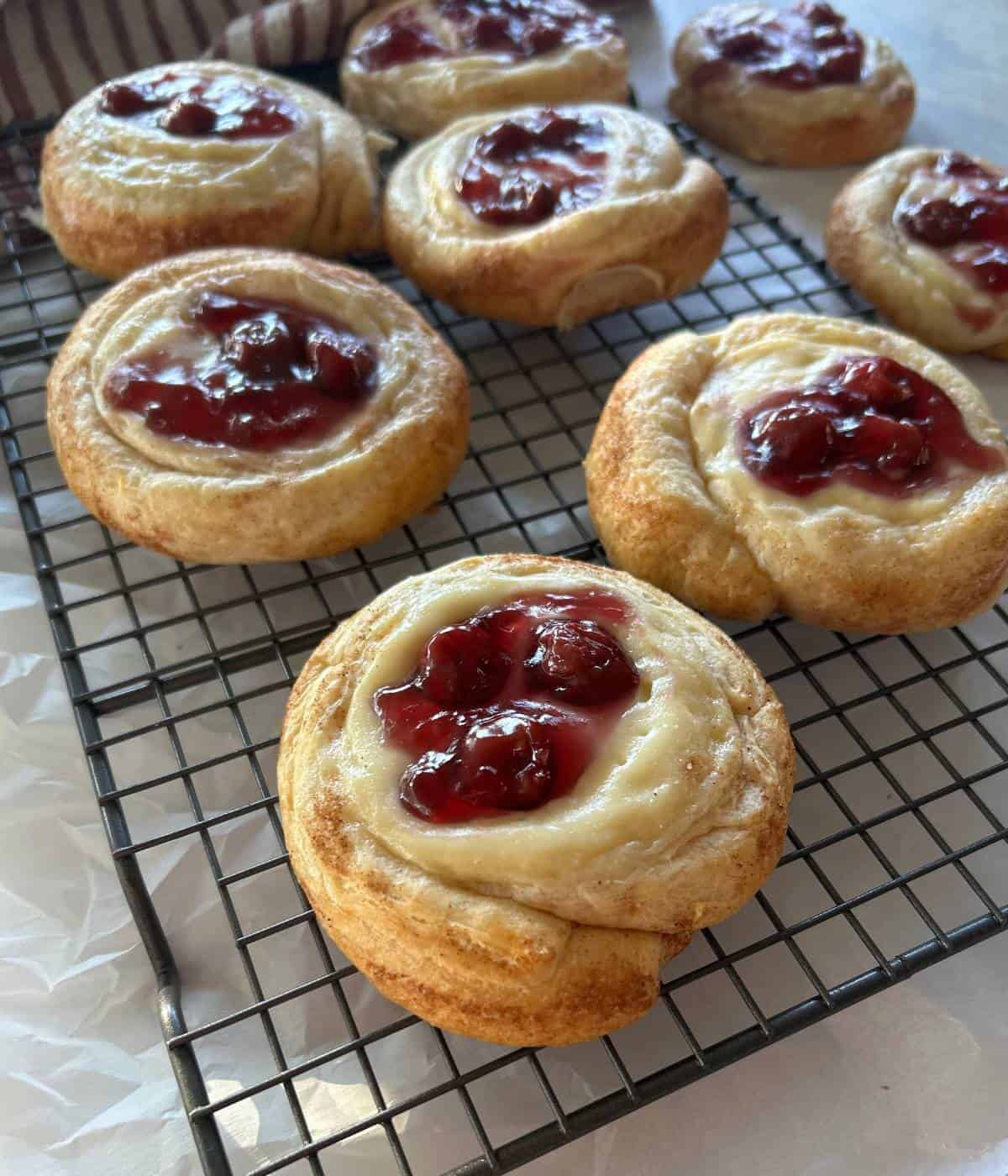 Cherry Cheese Danishes on baking rack.