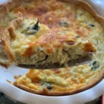 Spinach artichoke quiche slice.