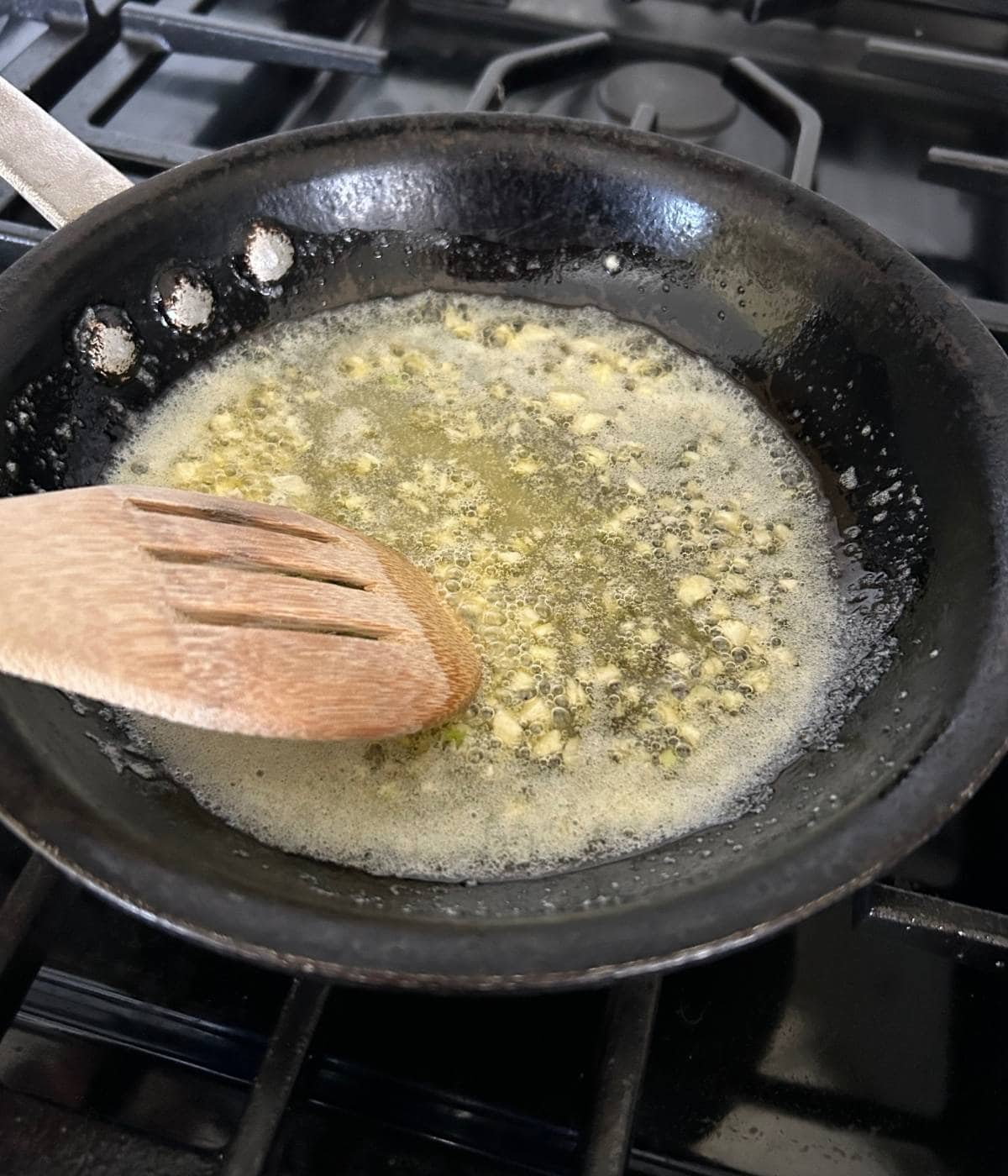 Garlic sautรฉing in butter.