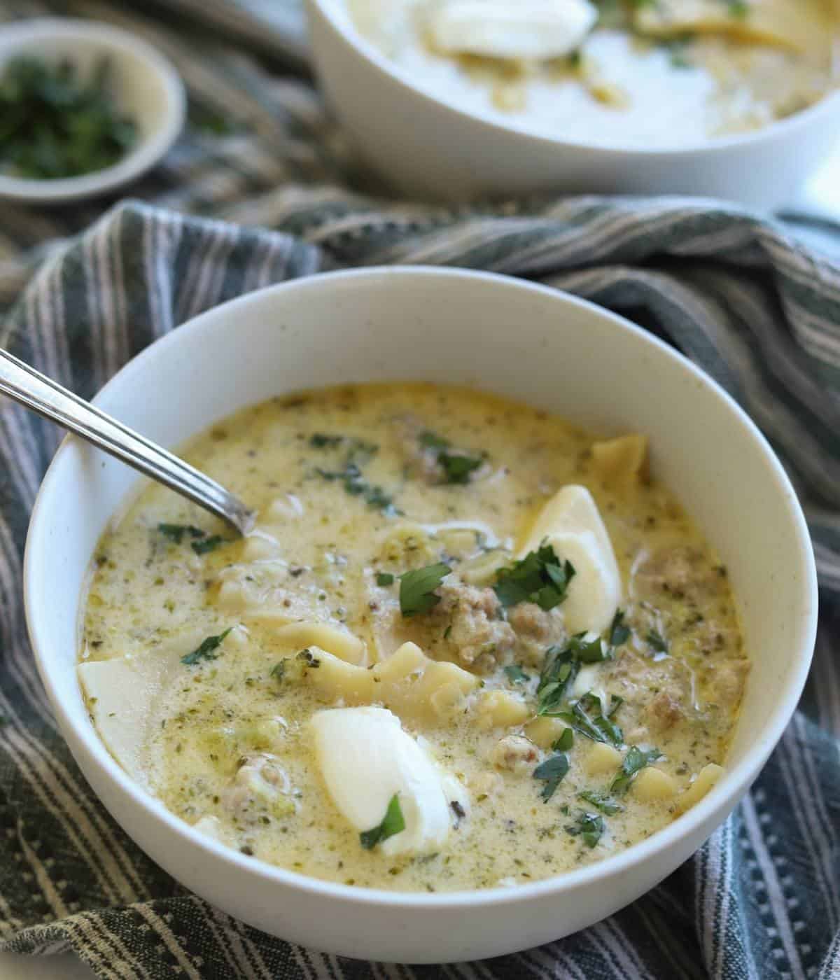 White lasagna soup in bowl. 