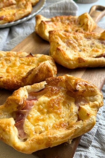 Ham and Cheese Puff Pastry Tarts on tray.