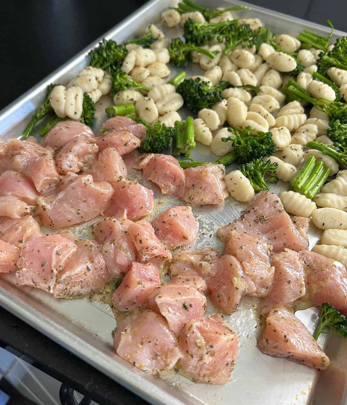 Chicken, gnocchi and broccolini on sheet pan.