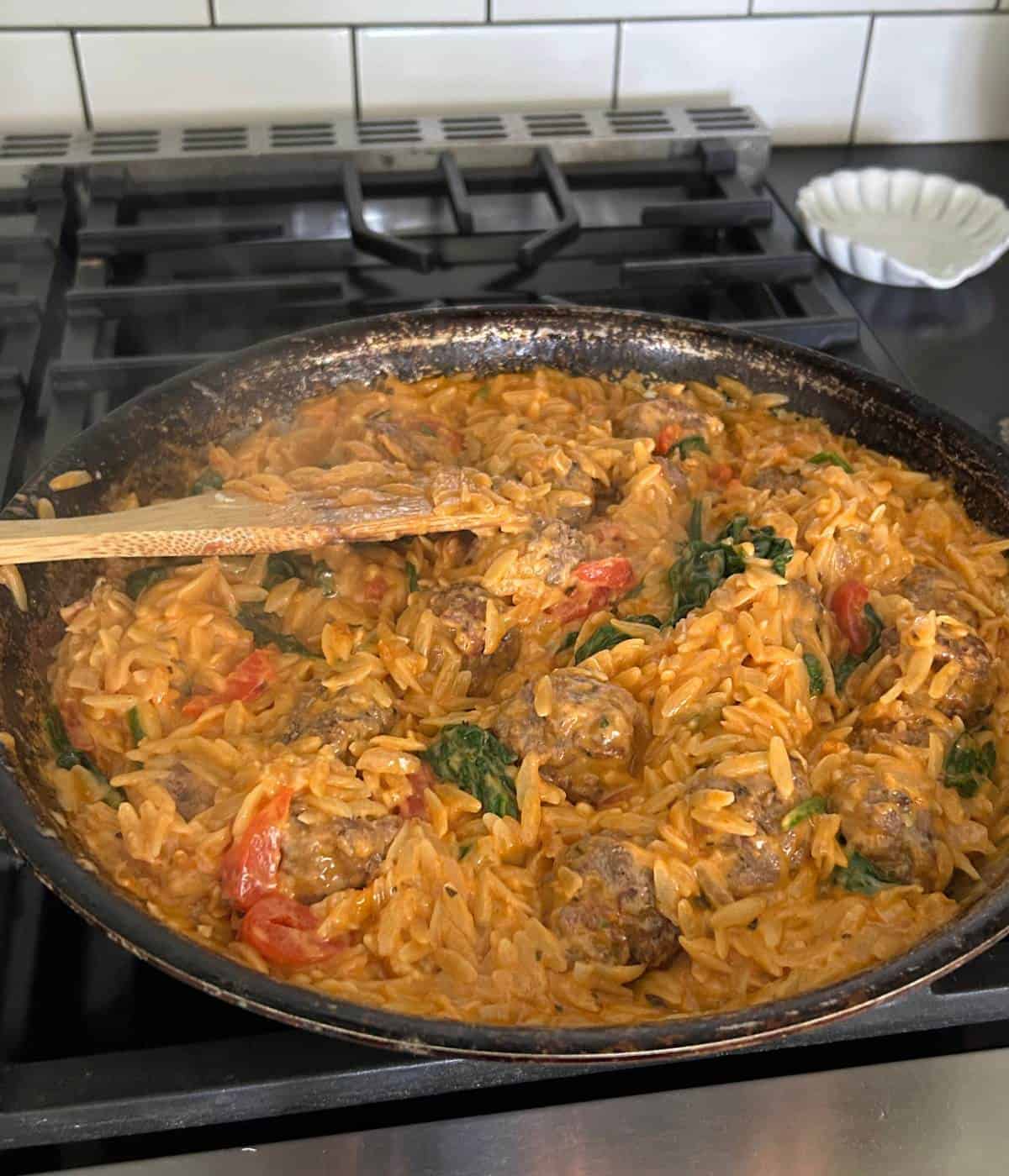 Adding cheese and roasted red peppers.