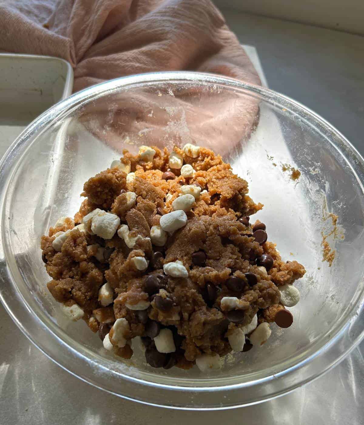 Cookie batter with chocolate chips and marshmallows.