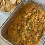 Smoked queso with beef and velvetta in tin.