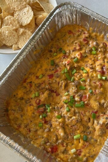 Smoked queso with beef and velvetta in tin.