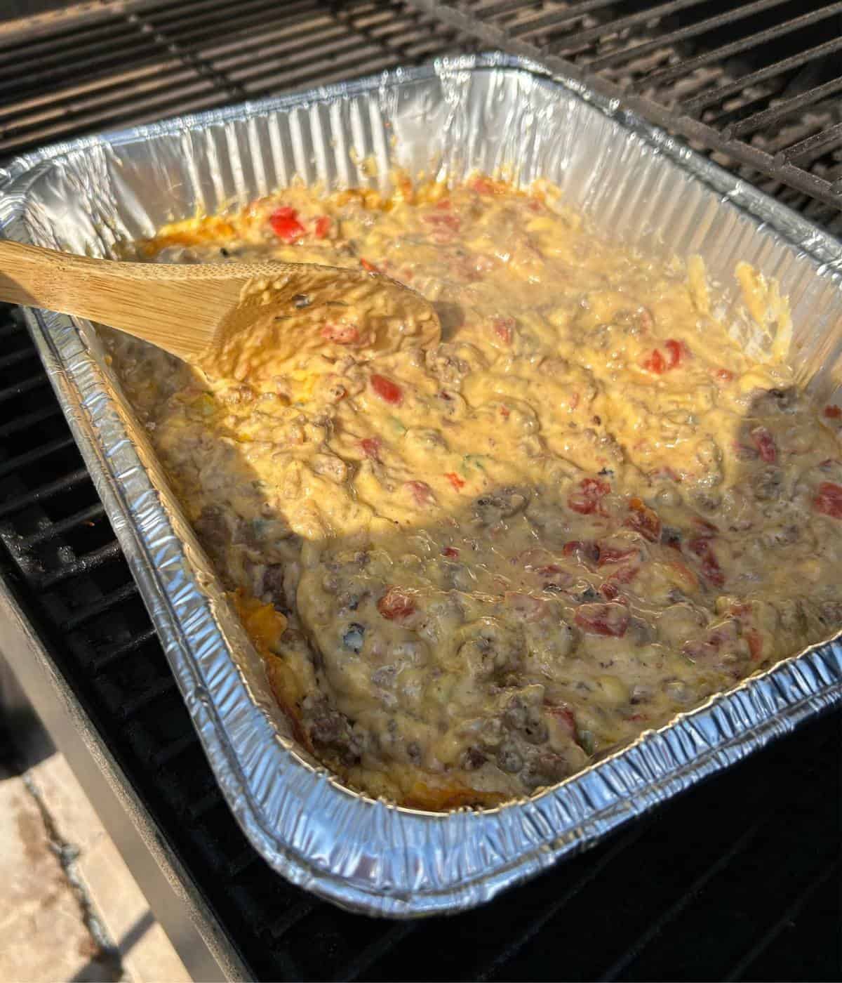 Smoked queso in tin.
