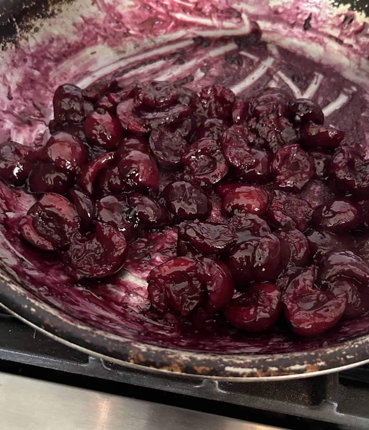 Cherry sauce in skillet.