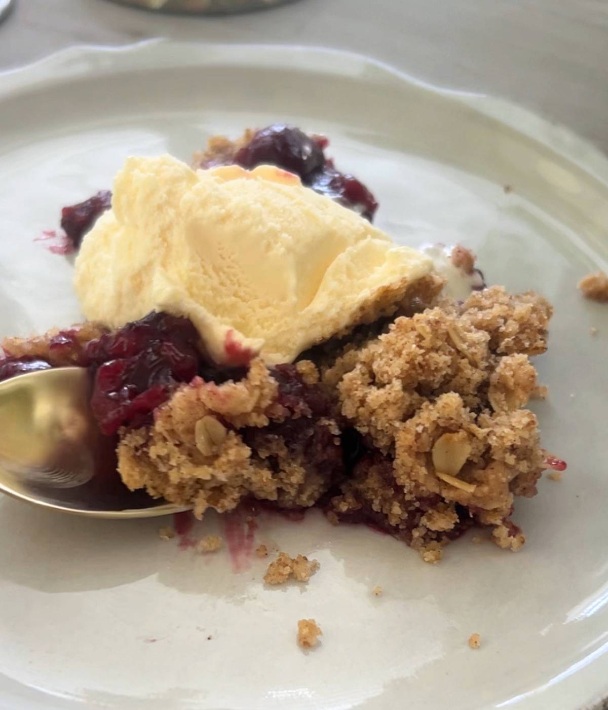 Cherry crumble with vanilla ice cream.