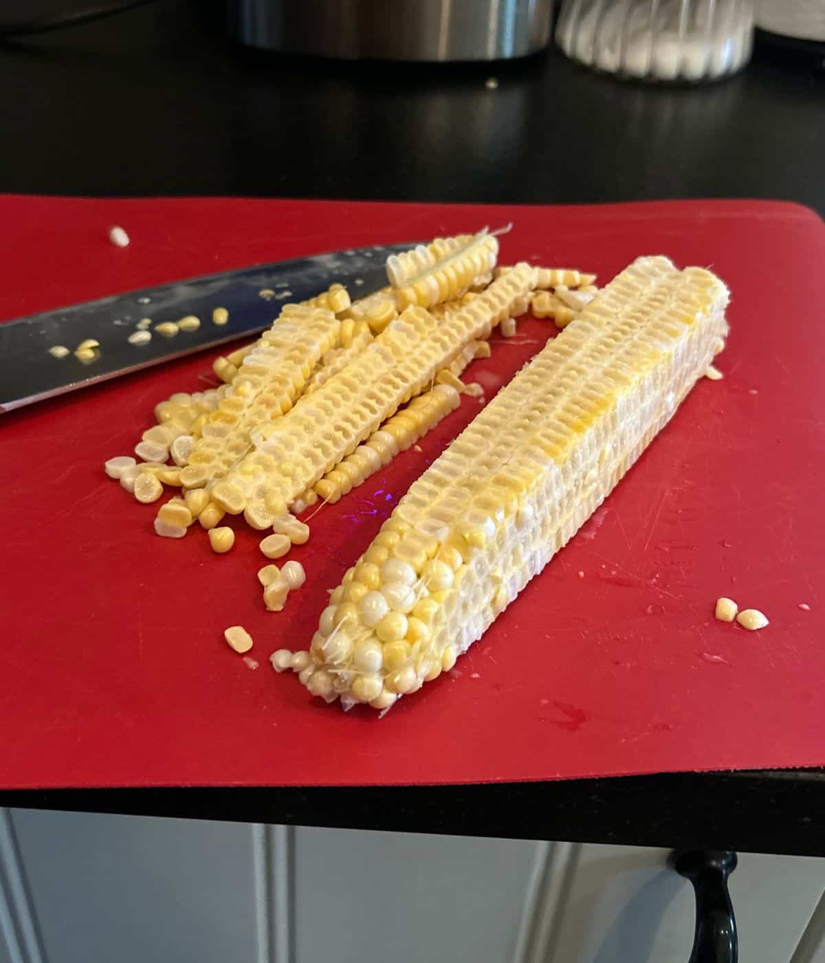 Corn salad ingredients in bowl.