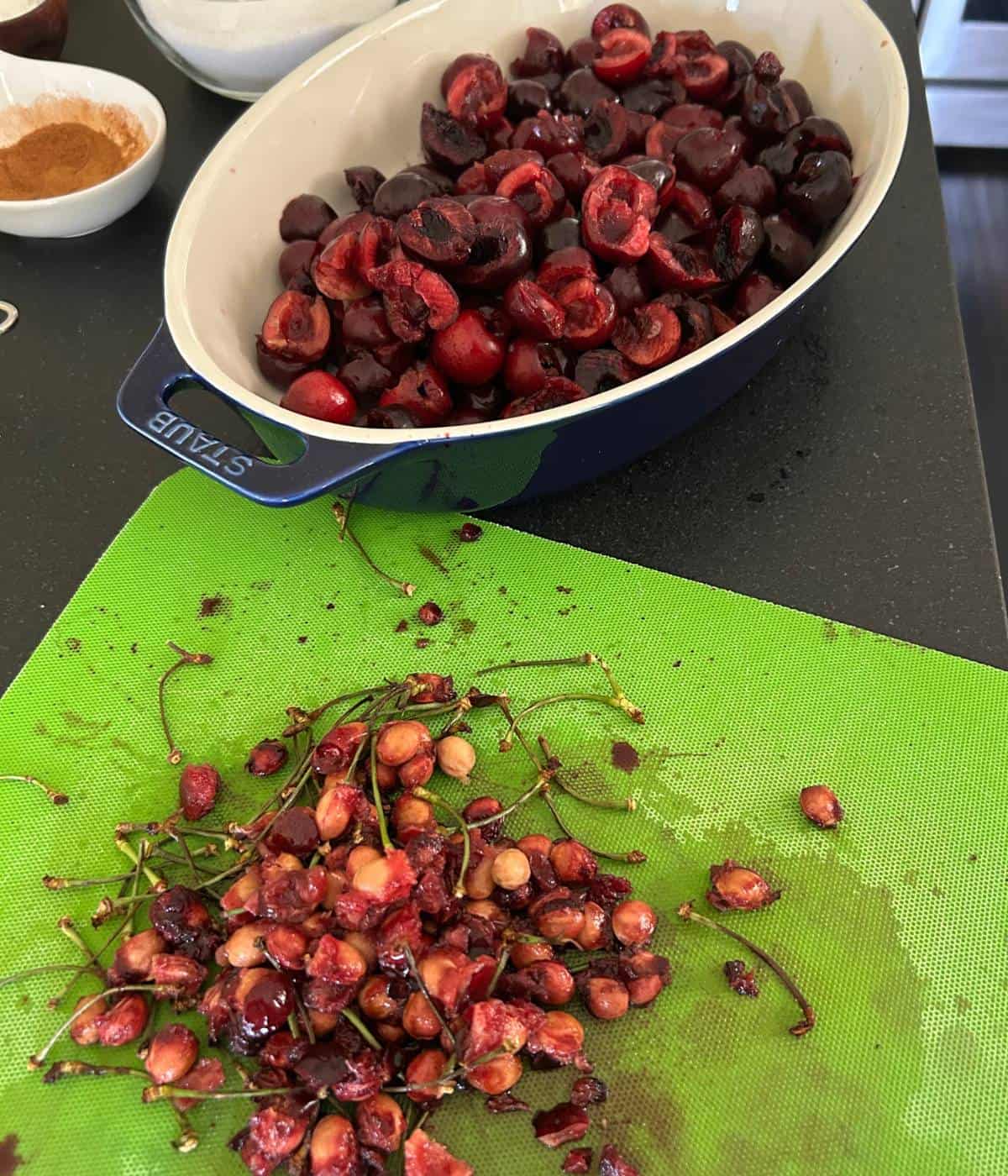 Pitted and halved fresh cherries.