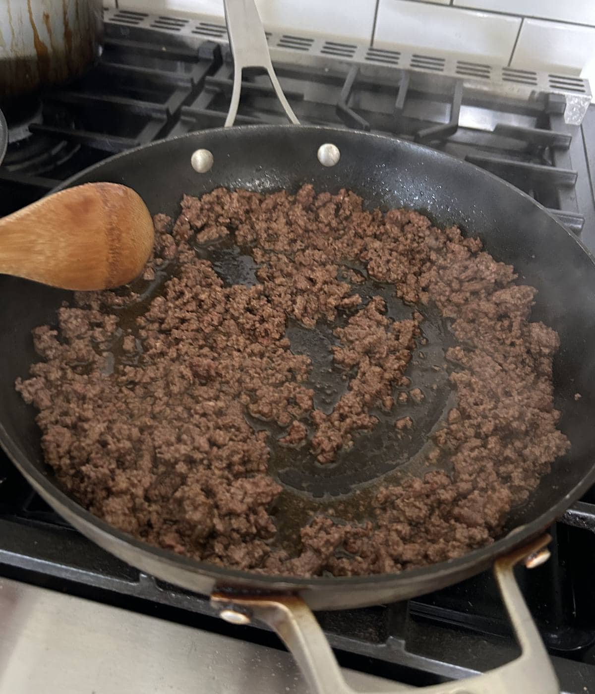 Sautéed ground beef in the skillet.