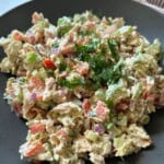 Creamy asian chicken salad in bowl.
