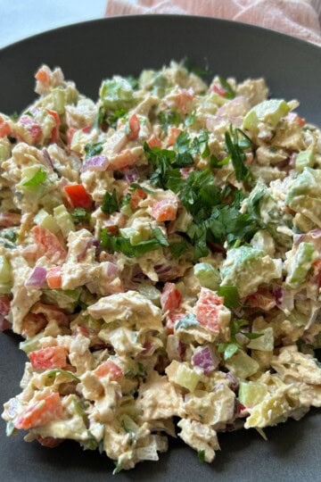 Creamy asian chicken salad in bowl.