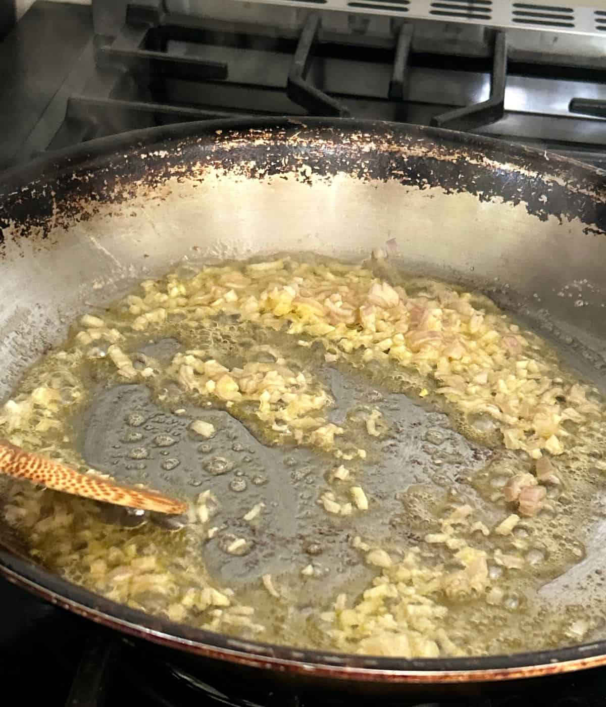 Shallot and garlic cooking in butter.