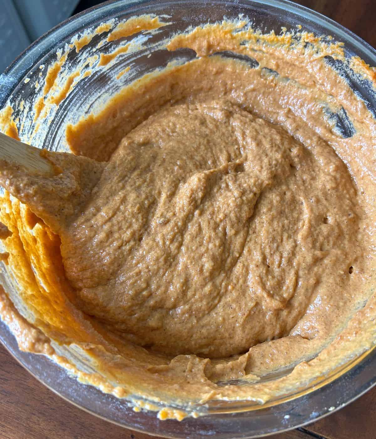 Pumpkin cake batter in bowl.