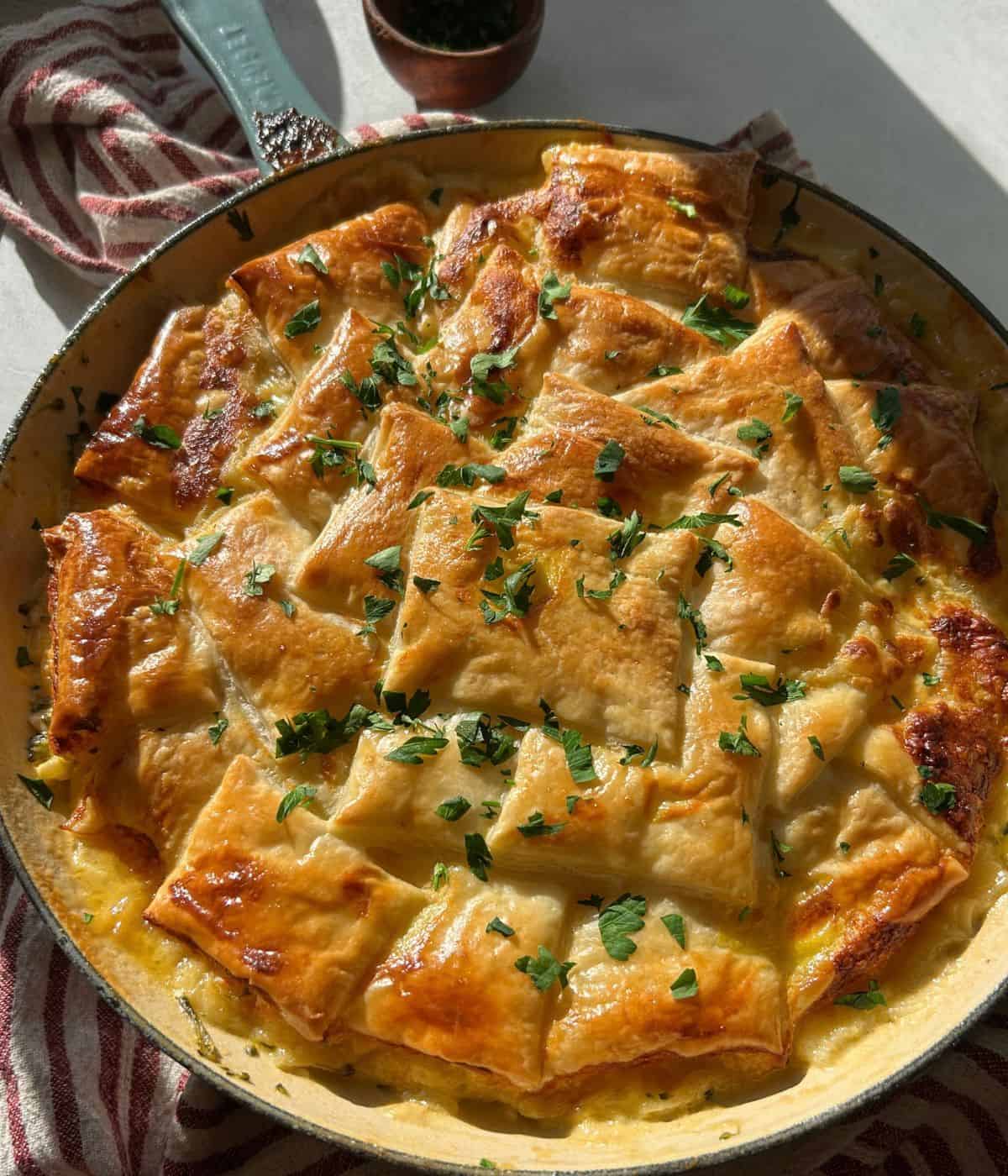 Chicken pot pie with puff pastry crust.